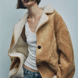 SHEARLING-LINED COAT WITH BUTTONS